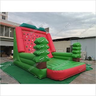 Inflatable Forest Theme Climbing Wall Bouncer Red And Blue Inflatable Sports Climbing Game