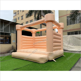 Pastel Peach Wedding Bounce House Castle